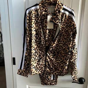 Animal print, jogging, set zip up jacket with pull on pants.